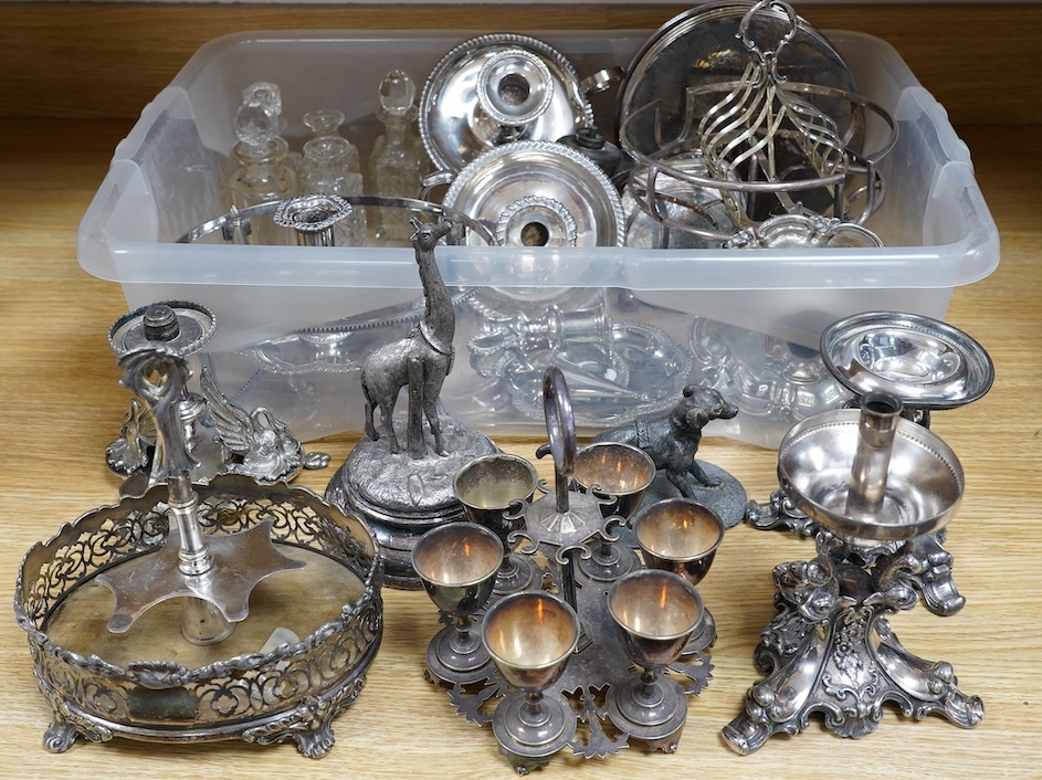 A quantity of silver plated wares, including stands, place mats, a toast rack, candleholders, etc. Condition - fair